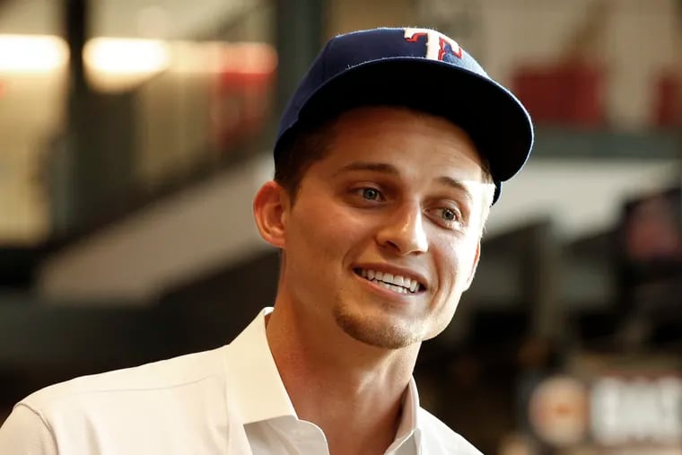 New Texas Rangers infielder Corey Seager visiting with reporters at a press conference on Dec. 1, 2021, in Arlington, Texas.