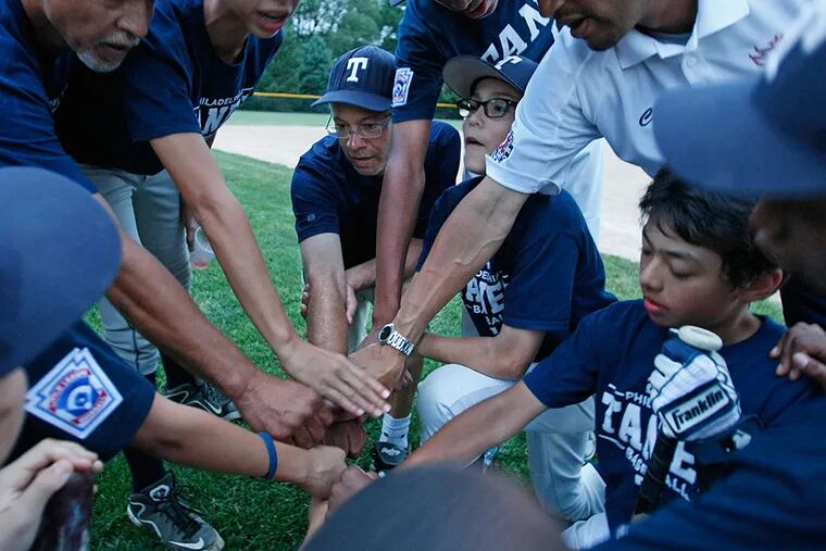 Manager Alex Rice gathers the Taney Dragons after practice. The racially diverse Pennsylvania Little League championship squad also includes Mo'ne Davis, the only girl playing on any of the state's eight top teams. RON CORTES / Staff Photographer