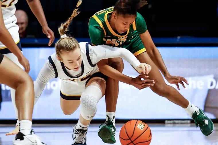 Drexel Grace O'Neill and Norfolk State Da'naijah Williams try for the loose ball during the fourth quarter on Nov. 8.  Norfolk State beats Drexel 51-49.