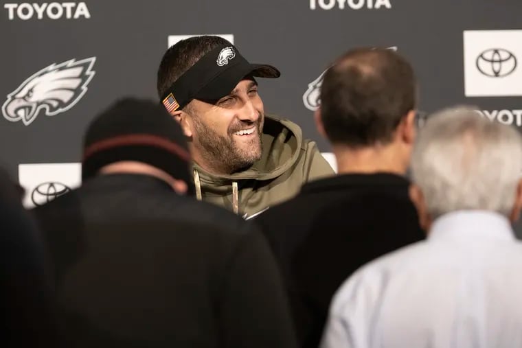 Eagles head coach Nick Sirianni jokes with reporters after a press conference in December.