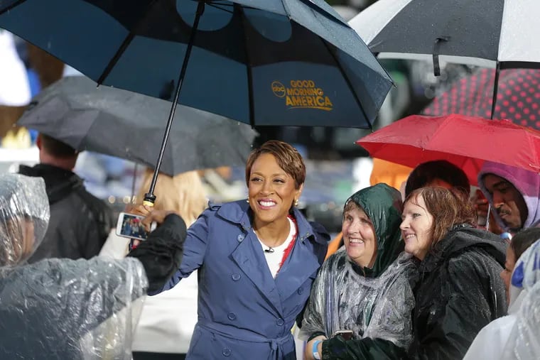 Anchor Robin Roberts poses with fans as “Good Morning America" broadcast from Eakins Oval on Benjamin Franklin Parkway on Thursday.