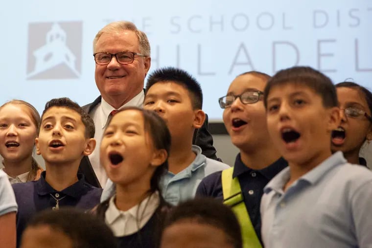 Republican nominee for governor Scott Wagner poses for a photo with students from the Anne Frank Elementary School after a gubernatorial forum.