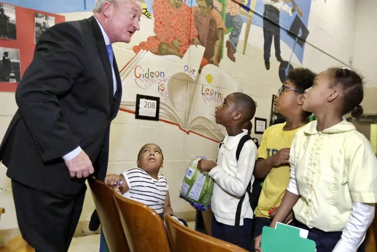 Mayor Kenney makes faces while meeting second graders at Gideon Elementary School.