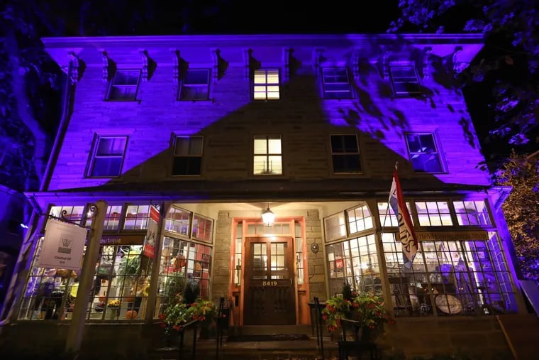 Chestnut Hill lights its facades for nightly strolls along Germantown Avenue this month.