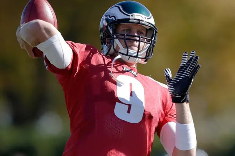 Eagles quarterback Nick Foles throws a pass during practice at the NFL football team's training facility, Wednesday, Nov. 6, 2013, in Philadelphia. (Matt Rourke/AP)