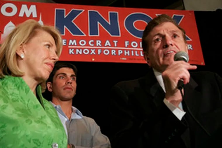 Tom Knox speaks at the Loews Philadelphia Hotel after he conceded the election to Nutter. With him were his wife, Linda, and son T.J.