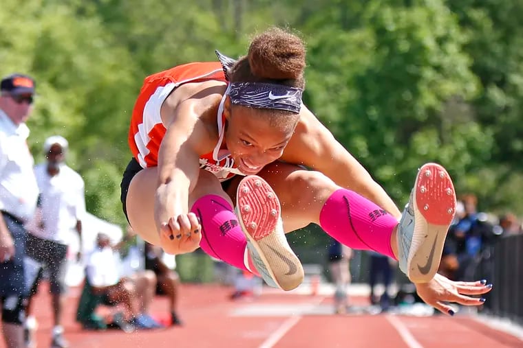 Christina Warren of Perkiomen Valley soars in the Class AAA triple jump en route to winning with a mark of 41 feet, 1/2 inch at the PIAA District 1 track and field championships Saturday, May 18, 2019 at Coatesville. LOU RABITO / Staff