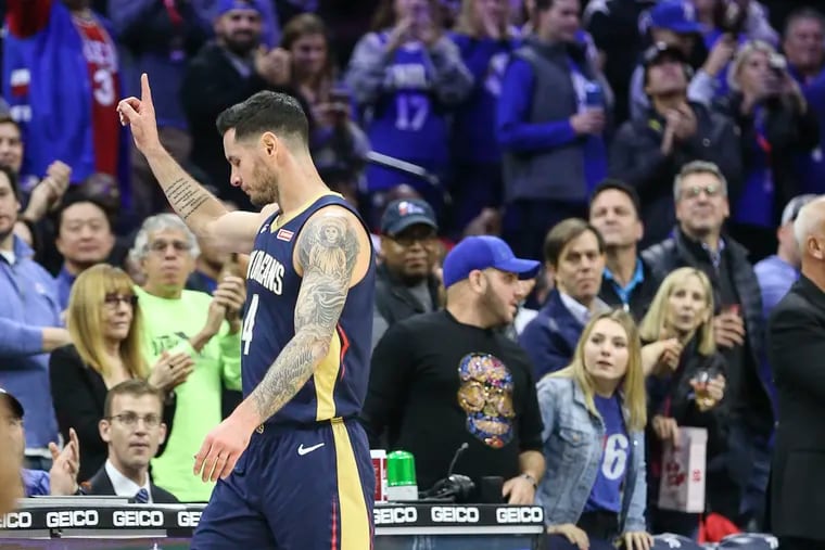 Pelicans' JJ Redick waves to the fans as he was welcomed back while playing his former team during the 1st quarter at the Wells Fargo Center in Philadelphia, Friday, December 13, 2019.