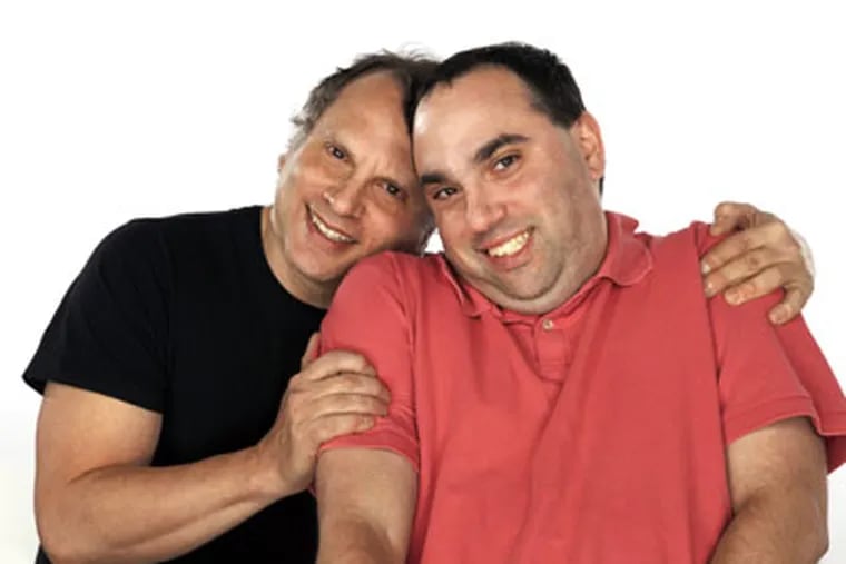 Local author Buzz Bissinger (left) has written a book about his son Zach.