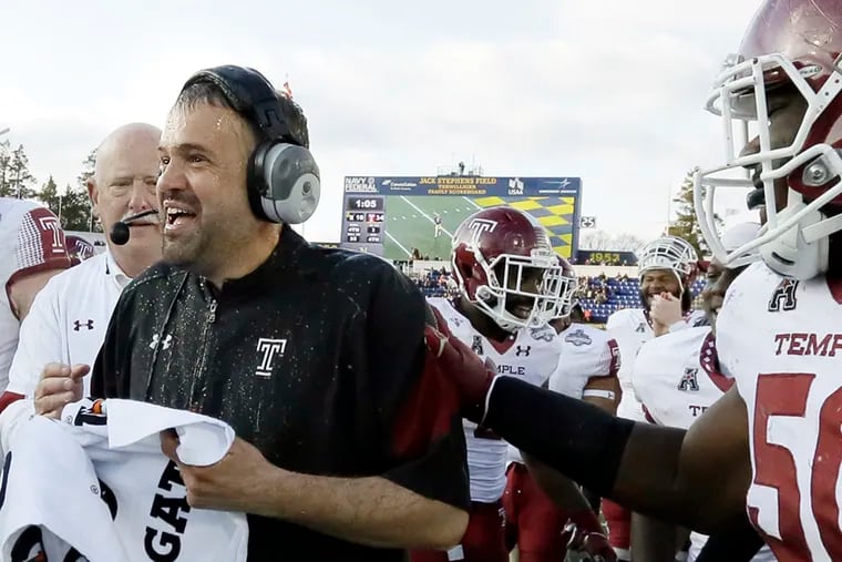 Temple coach Matt Rhule has water cooler dumped on him at the end of 2016 AAC championship game.