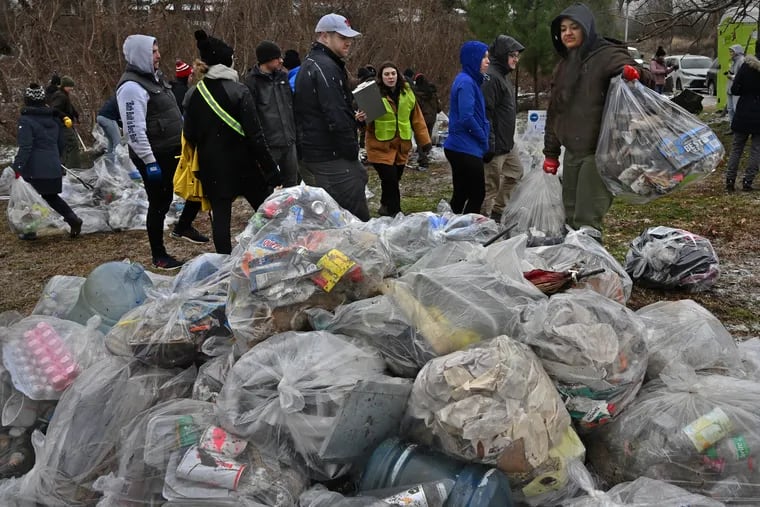 A Martin Luther King Jr. Day event in Washington, D.C., in January involved cleaning up plastic bottles and other items along railroad tracks.