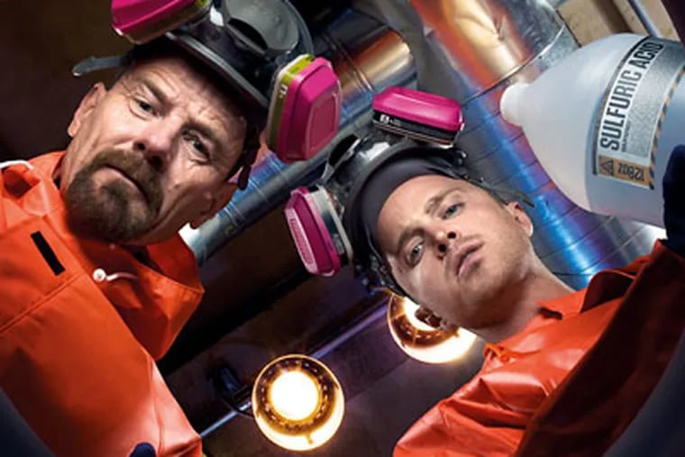 Bryan Cranston (left) and Aaron Paul play a chemistry-teacher-turned-meth-maker and his partner, a former slacker student.