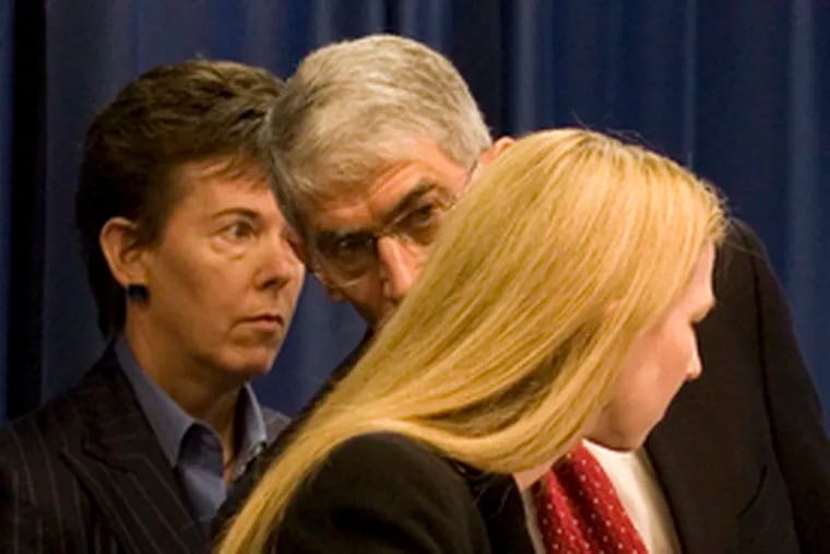 Acting U.S. Attorney Laurie Magid (right) announcing federal charge with the FBI&#0039;s Janice Fedarcyk (left) and prosecutor Mike Levy.