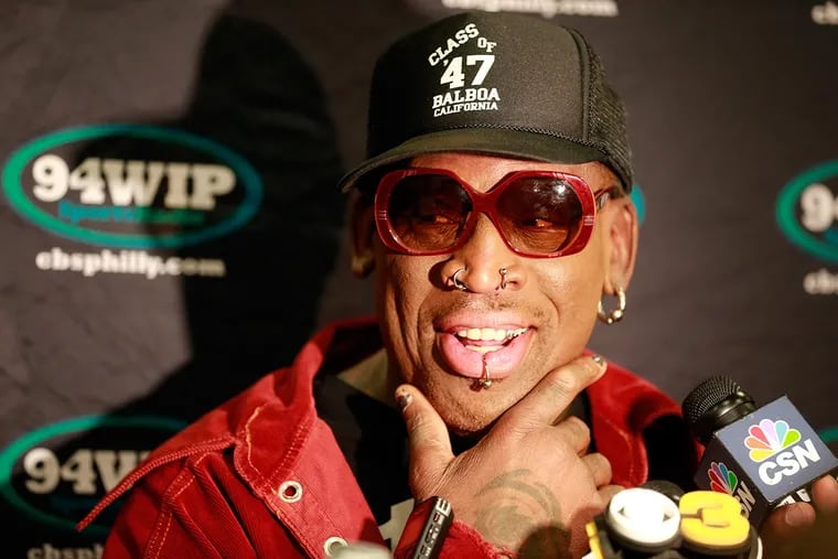 FILE - Former NBA player Dennis Rodman arrives at the Wells Fargo Center for Wing Bowl on Friday, Feb. 5, 2016. The owner of a Southern California yoga studio is accusing Dennis Rodman of helping two people steal more than $3,500 in merchandise.