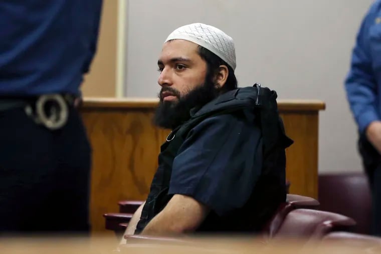 FILE - In this Dec. 20, 2016 file photo, Ahmad Khan Rahimi, the man accused of setting off bombs in New Jersey and New York's Chelsea neighborhood, sits in court in Elizabeth, N.J. Rahimi, an Islamic terrorist already serving a life prison term for a bombing in New York City, was convicted Tuesday, Oct. 8, 2019, of multiple counts of attempted murder and assault stemming from a shootout with police three years ago in New Jersey. (AP Photo/Mel Evans, File)