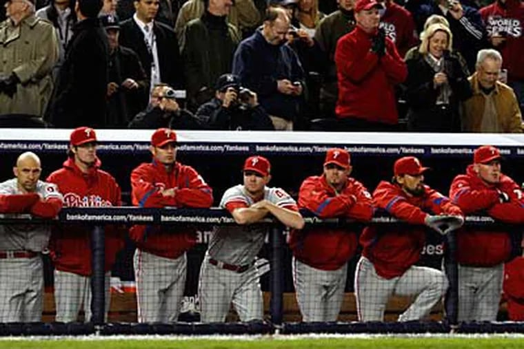 The Phillies watch the end of the game against the New York Yankees on Wednesday, November 4, 2009. (Ron Cortes / Staff Photographer)