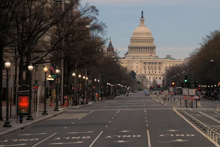 The U.S. Capitol on a vacant Pennsylvania Avenue in Washington, D.C., on March 20, 2020.