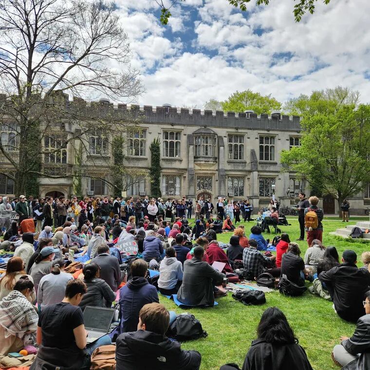 Students on the campus of Princeton University on April 25 after tents set up by protesters were taken down voluntarily. Two graduate students were arrested for trespassing.