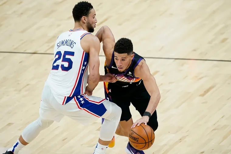 Suns guard Devin Booker (right) driving past 76ers guard Ben Simmons in February. Wednesday's game could be an interesting rematch of top teams.