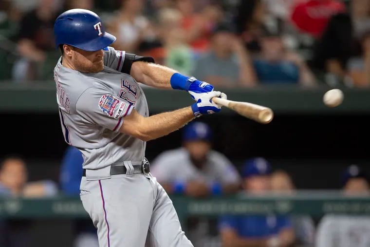 Texas Rangers' Logan Forsythe hits a double during the seventh inning of the team's baseball game against the Baltimore Orioles , Thursday, Sept. 5, 2019, in Baltimore. (AP Photo/Tommy Gilligan)