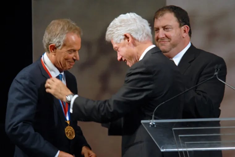 Former president Bill Clinton presents the 2010 Liberty Medal to
former British prime minister Tony Blair on Sep. 13, 2010 at the National Constitution Center. (Tom Gralish / Staff Photographer)