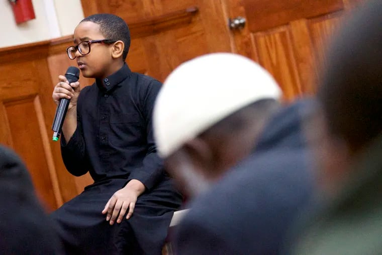 A young boy participates in a Quran Memorization competition at Al Aqsa Islamic Society in Philadelphia on April 7, 2019.
