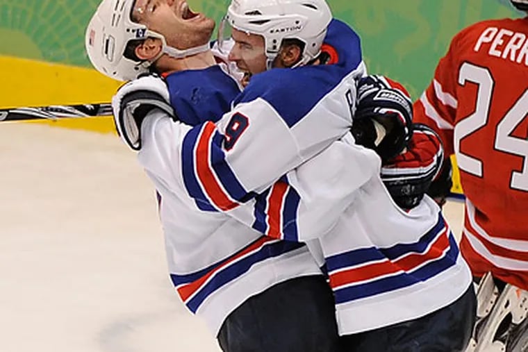 Ryan Kesler (left) scored the goal that sealed the United States'  win. (Clem Murray/Staff Photographer)