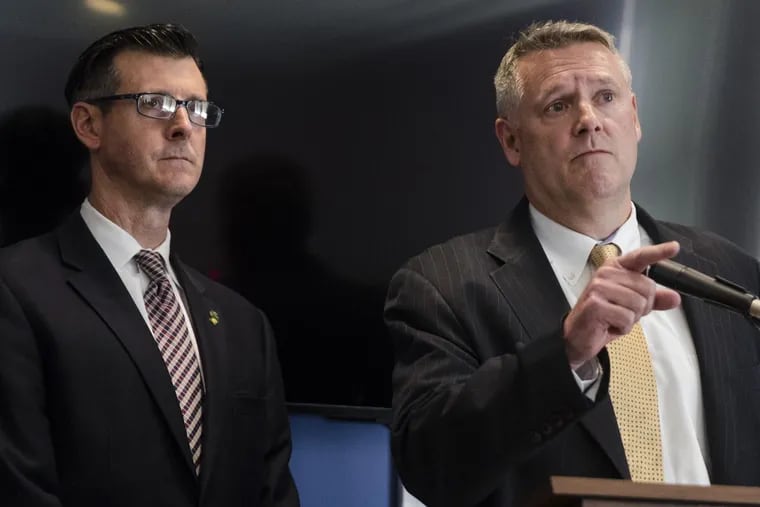 Acting New Jersey U.S. Attorney William E. Fitzpatrick, right, accompanied by FBI Special Agent in Charge Timothy Gallagher, speaks during a news conference in Camden.