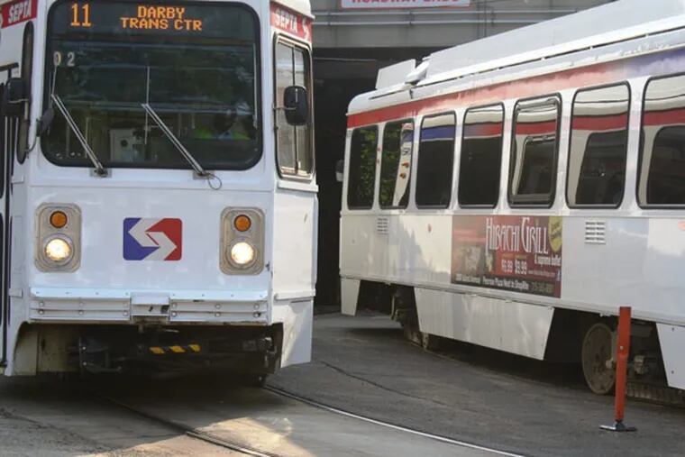 SEPTA trolleys at the portal to the Center City tunnel.