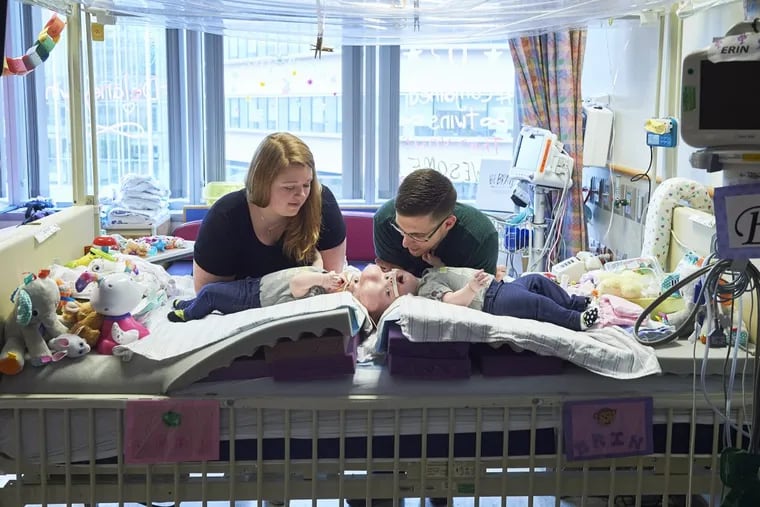 Heather and Riley Delaney of North Carolina with their daughters, Erin and Abby, at Children’s Hospital of Philadelphia before the conjoined twins were successfully separated on June 6.