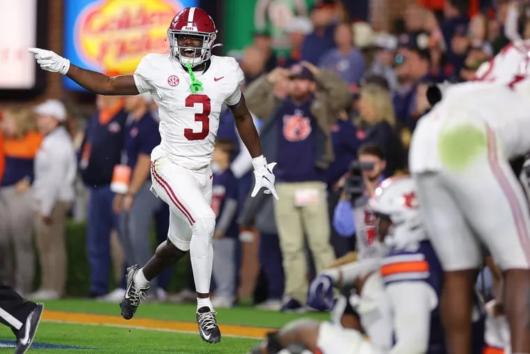 Terrion Arnold #3 of the Alabama Crimson Tide reacts after intercepting the final pass of the game in their 27-24 win over the Auburn Tigers at Jordan-Hare Stadium on November 25, 2023 in Auburn, Alabama.