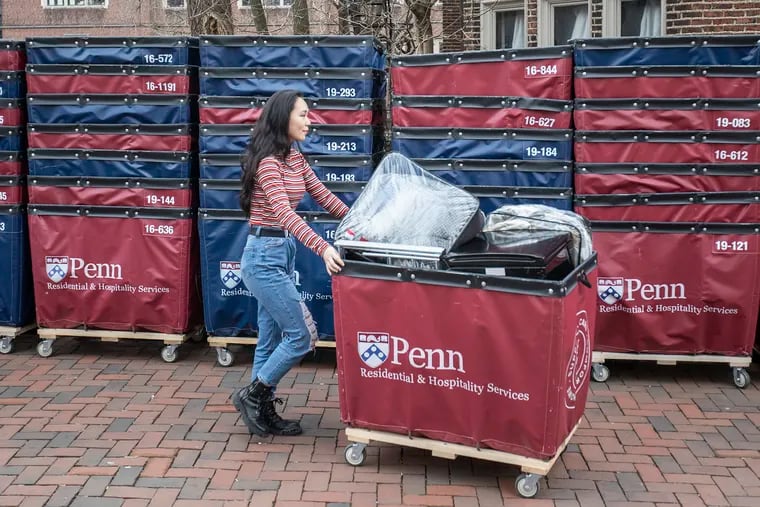 The University of Pennsylvania announced Tuesday that its fall semester will be conducted virtually, with dorms closed to most students. A student is shown moving out of Penn dorms in this March 2020 file photo.