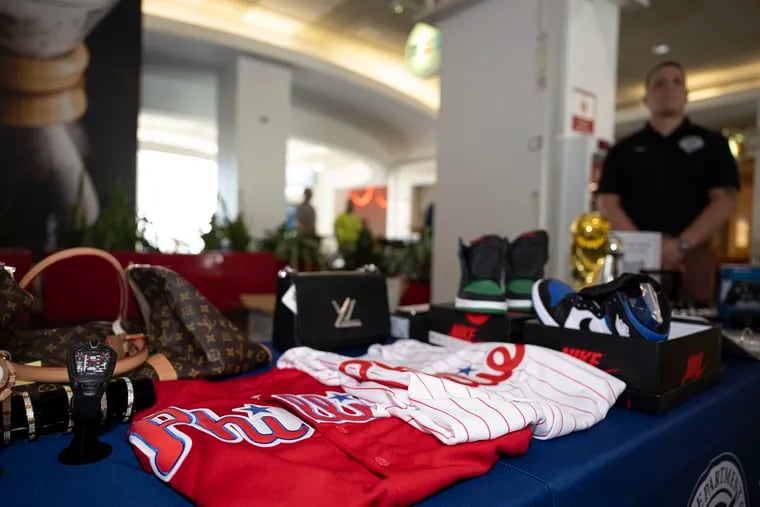 U.S. Customs and Border Protection display counterfeit items on Friday during a demonstration at Philadelphia's airport highlighting some of the wildest counterfeit items seized.