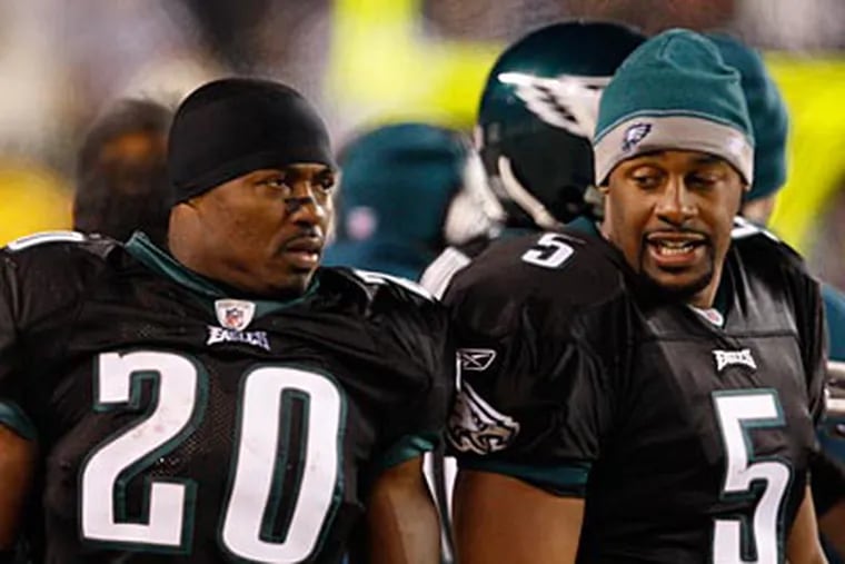 Former Eagles Brian Dawkins and Donovan McNabb were once faces of the franchise. (David Maialetti / Staff file photo)