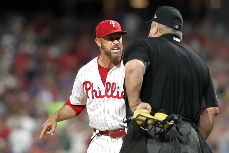 Manager Gabe Kapler, left, of the Phillies argues with home plate umpire Joe West after Scott Kingery was a struck by a pitch in the 6th inning p against the Mets at Citizens Bank Park on June 25, 2019.