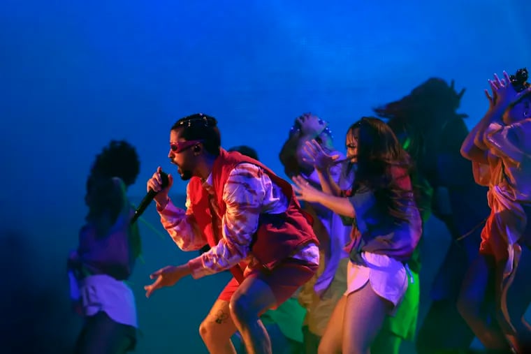 Bad Bunny performs on the Rocky Stage during the Made in America 2022 festival on the Ben Franklin Parkway Sunday night. Earlier that day he spent $50,000 on dancers and drinks at Sin City Cabaret Nightclub, says the delighted owner of the Southwest Philly gentleman's club.