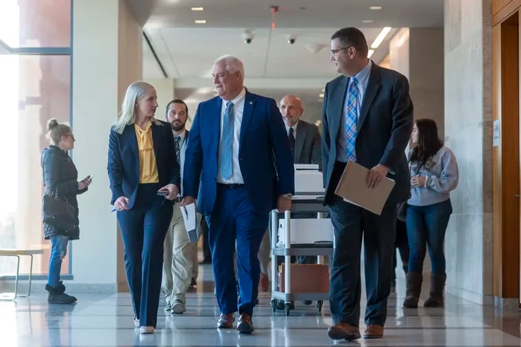(From left) Bucks County Deputy District Attorney Kate Kohler, District Attorney Matt Weintraub, and First Assistant District Attorney Gregg Shore exit the courtroom after Sean Kratz was found guilty last week.