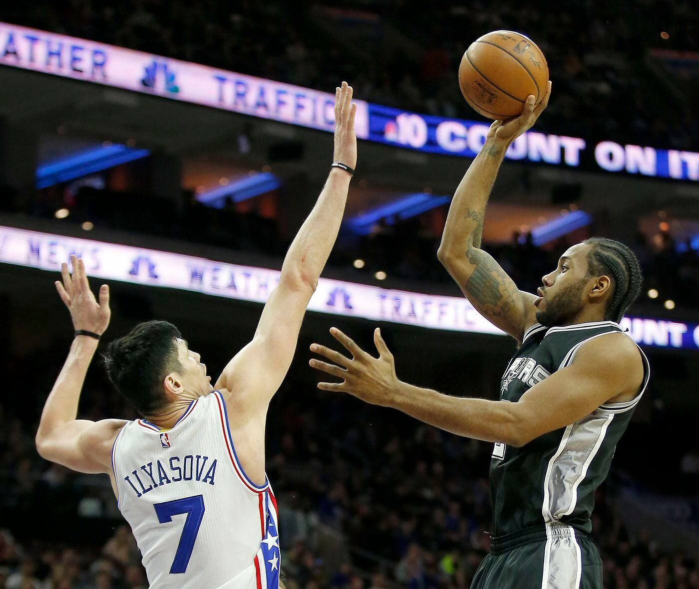 How much should the Sixers be willing to part with in a trade for Kawhi Leonard (right)?