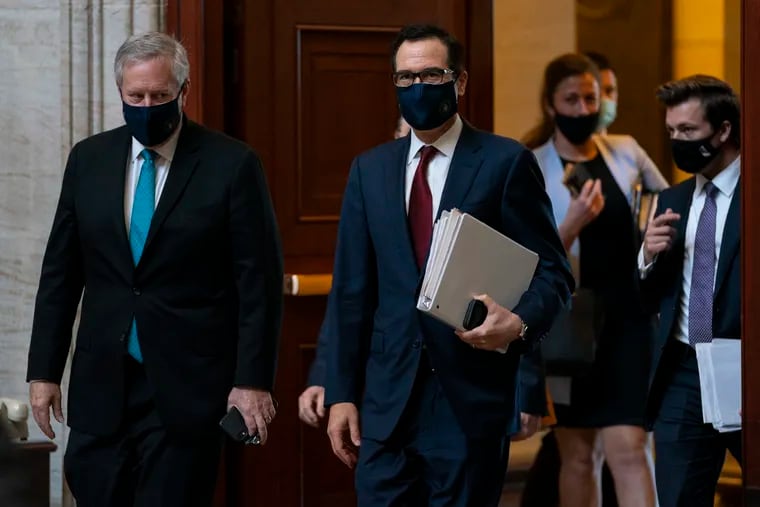 Treasury Secretary Steven Mnuchin, center, and White House chief of staff Mark Meadows, left, on Capitol Hill in Washington on Wednesday. A major pain point in Congress’ current stimulus negotiations is whether the feds will provide any additional money to states.