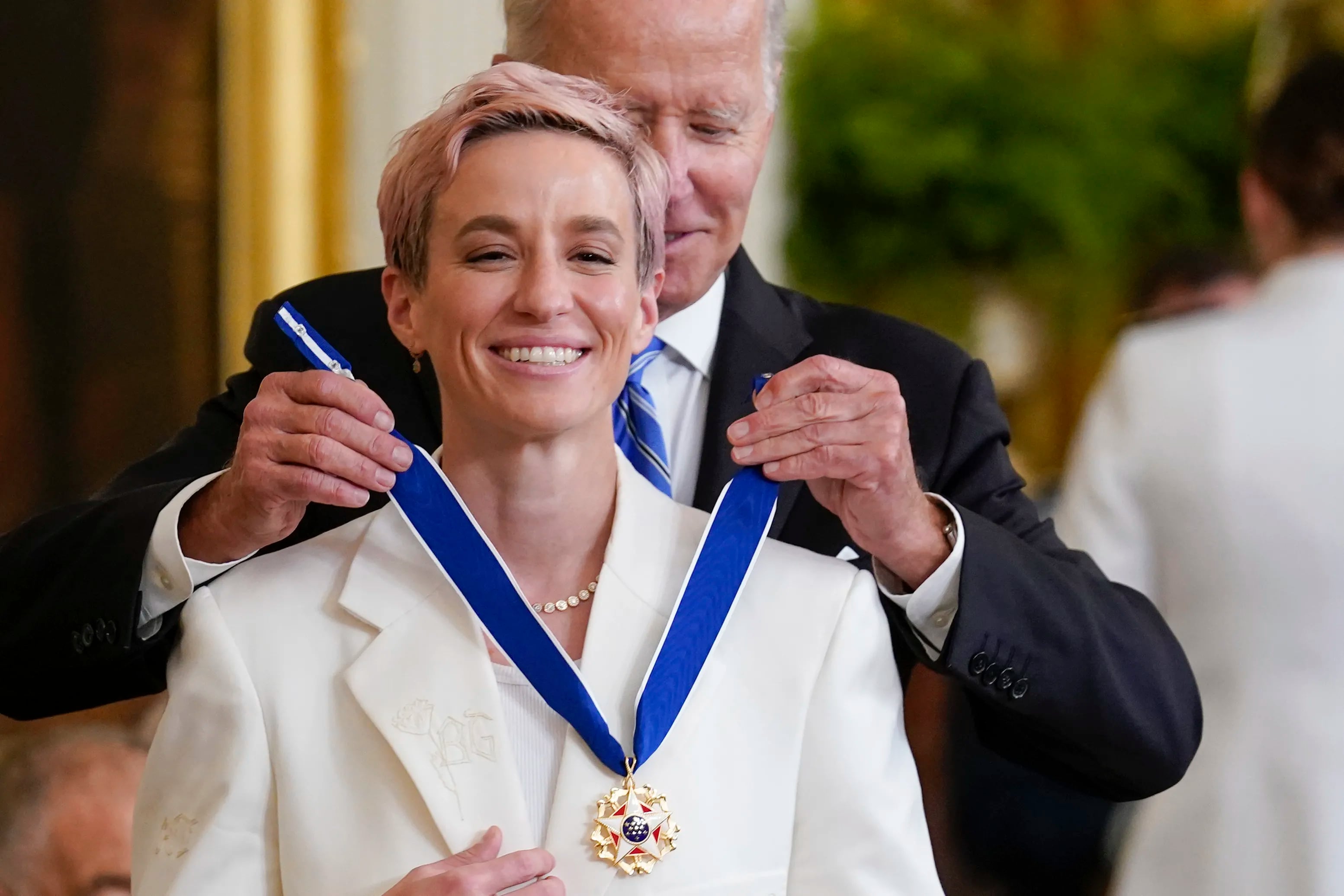 President Joe Biden awards the nation's highest civilian honor, the Presidential Medal of Freedom, to Megan Rapinoe at the White House in Washington, Thursday, July 7, 2022.