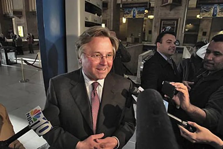 Philadelphia Media Holdings chief executive Brian P. Tierney answers reporters' questions in 30th Street Station on Wednesday evening. (David M Warren / Staff Photographer)