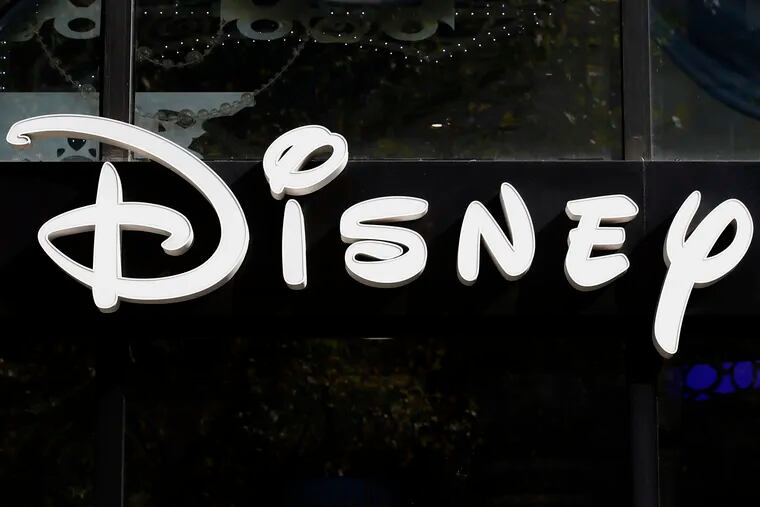 A sign at the Disney store on the Champs Elysees Avenue in Paris, France.