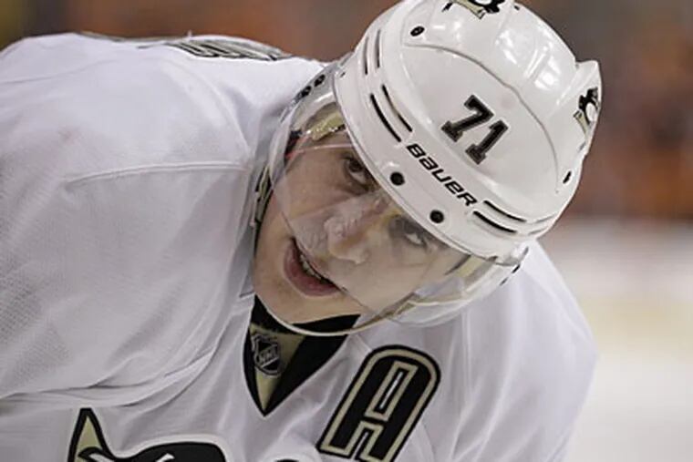 NHL MVP Evgeni Malkin agreed to play with Metallurg in Russia's Kontinental Hockey League. (Matt Slocum/AP)