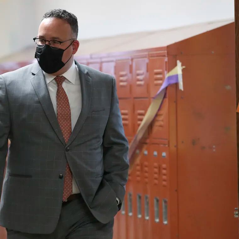 U.S. Education Secretary Miguel Cardona, shown in this 2021 file photo walking through the hallways of a school in Upper Darby, announced six local schools had been named National Blue Ribbon Schools of Excellence.