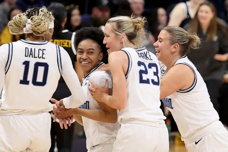 Villanova players rush to Zanai Jones, 2nd from left, and she hit a clutch 3-pointer in the 2nd half.  L-R: Christina Dalce, Jones, MaddieBurke, and Kaitlyn Orihel of Villanova. Nova defeated Virginia Commonwealth in a first round WBIT game on March 21, 2024 at the Finneran Pavilion at Villanova University.