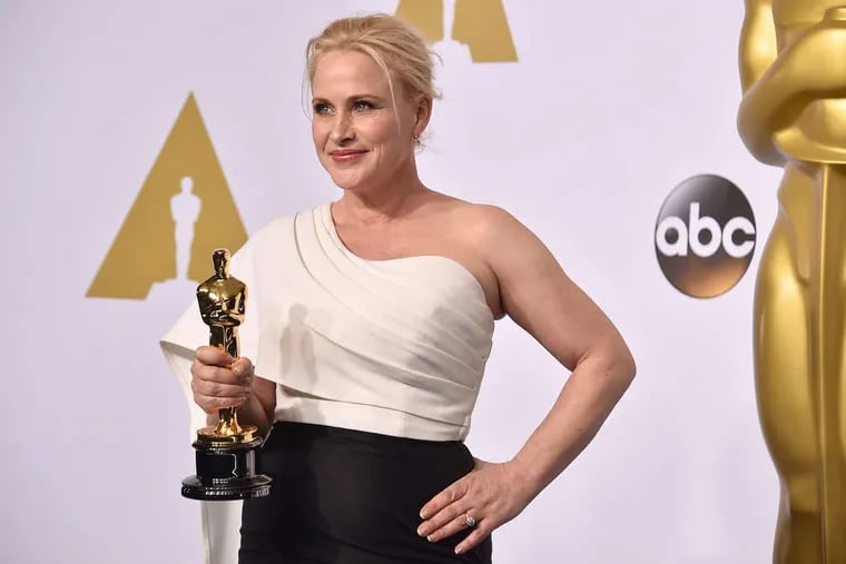 Patricia Arquette with her Oscar for best supporting actress in &quot;Boyhood,&quot; a movie 12 years in the making. In her acceptance speech, she called for wage equality for women.
