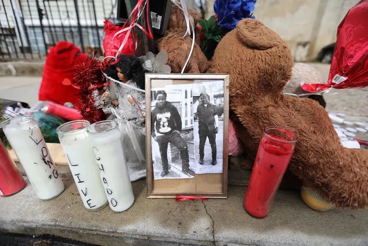 A memorial for Tauhid Collins, who was killed Friday, Feb. 15, 2019, is seen on the 5800 block of Angora Terrace on Monday, Feb. 18, 2019.