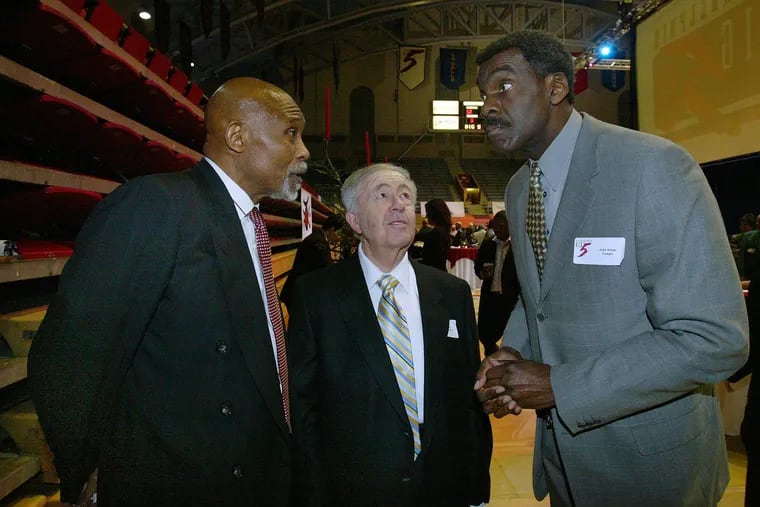 Jay Norman, left, with the late Al Shrier (center) and John Baum talk during the 50th anniversary of the Big 5 celebration at the Palestra in 2006.