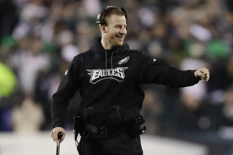 Carson Wentz was on the sideline with his teammates during the NFC championship game win over the Minnesota Vikings that sent the Philadephia Eagles to the Super Bowl to play the New England Patriots.