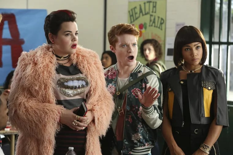 Melanie Field (left),  Brendan Scannell,  and Jasmine Mathews in a scene from “Heathers.”  Paramount Network says it will delay airing a television reboot of “Heathers” following the Florida high school shooting that left 17 dead. Paramount says in a Wednesday statement that it will not air the show until later this year “out of respect for the victims, their families and loved ones.”